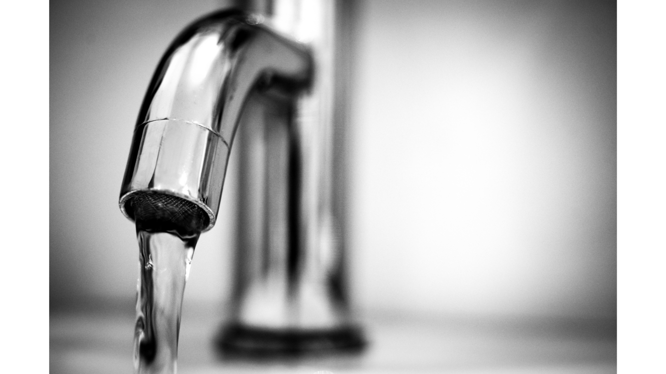 Water running through a faucet 